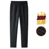 Pantaloni da uomo Maschili Spessi Caldi Caldi Termici Peluche Antivento Impermeabile Carica 2023 Pantaloni In Pile Invernali Plus Size 5XL Nero