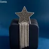 Donia jewelry luxury brooch European and American fashion five-pointed star titanium micro-inlaid zircon creative designer brooch gift box.