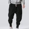 Pantalon pour hommes noir rouge hip hop streetwear mode jogger sarouel homme pantalon de survêtement décontracté mâle grande taille 4XL