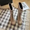 Bottes de créateurs Sole de talon épais long Fashion Square Toe Femme Rain Men Rubber NOUVEAU ANTAPHOP ANTIZ SLOP HAUT TUBE Couleur pure haute qualité