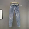 Damskie dżinsy przemysł ciężki dhinestone chudy 2023 wiosna letnie elastyczne elastyczne talia cienkie spodnie ubrania koreańskie ni