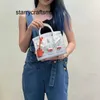 Bolsos de cuero genuino Bolso de mujer genuino italiano Mini bolso pequeño para casa 2023 Bolso bandolera de un solo hombro Bolso pequeño portátil versátil para mujer