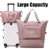 2021 Bolsa plegable de almacenamiento de gran capacidad Bolsas de viaje Tote Bolsa de equipaje de mano Conjunto de lona impermeable Mujeres Drop Shippiing298R