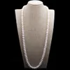 Design 10-11mm 82 cm perle d'eau douce blanche grand pain cuit à la vapeur perles rondes collier de perles chaîne de pull bijoux de mode 284t