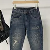 Jeans da uomo Pantaloni da cowboy da uomo con fori Pantaloni strappati rotti Strappati Abiti da lavoro Harem strappati Goth 2023 Autunno coreano Y2k Vintage