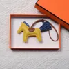 Classic women's bag pendant high-end handmade leather car key chain horse pendant meta with box186J