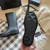 10A Botas de grife de salto grosso sola grossa botas longas moda dedo do pé quadrado mulheres botas de chuva homens mulheres botas de borracha novas impermeáveis antiderrapantes sapatos de chuva de tubo alto cor pura