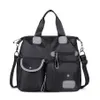 Nuevos bolsos de tela oxford de nailon con un solo hombro para mujer, nuevo bolso de mensajero portátil, bolso de viaje de gran capacidad, bolso para madre 309F