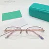 Nouveau design de mode femmes lunettes optiques 2125 petite forme ovale demi-monture en métal style simple et élégant lentilles claires lunettes de qualité supérieure