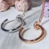 Ny stil diamantguld silverhänge halsband för män och kvinnor modedesigner design rostfritt stål nagel smycken219z