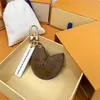 Porte-clés longes pour sac à biscuits, porte-clés suspendu pour voiture, fleur, bijoux à breloques, cadeaux pour femmes et hommes, clé en cuir PU à la mode