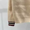 Дизайнерские свитера Женский свитер Осенний модный вязаный топ с длинными рукавами и V-образным вырезом в ретро-стиле и теплая толстовка Свитера Женская одежда Pull Femme