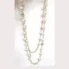 Naszyjnik designerski luksusowe wisiorki z literą klasyczny styl oświadczenie pasmowe sznurki elegancka łańcuch perłowy długi podwójny laya249p