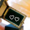 22091909 orecchini a bottone 0 12ct a forma di cuore cavo rotondo diamante quadrato au750 oro bianco gioielli da donna classico must h285a
