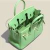 Designer 2023 Cowhide Rkinbir Layer Bag Lady Bags Top Lychee Classic Mönster Green Mini Trendy Leather Women's Portable Shoulder Tote 225C