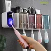 Toothbrush Holders ECOCO Wall Mounted Holder Automatic Toothpaste Squeezer Dispenser Mouthwash Cup Storage Rack Bathroom Accessories 231204