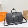 Designer Duffel Väskor överdimensionerade mode utomhuspaket för män kvinnor stora resehandväskor bagage väska klassisk läder tote 50 cm