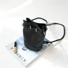 Ryggsäckens topplager Cowhide för kvinnors 2023 Mini Fashion Bucket Bag School