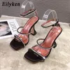 Sandaler Eilyeken 2024 Summer Ankle Buckle Strap Open Toe Women Sandaler Wedding Crystal Rhinestone Strange High Heels Gladiator Shoes 231204