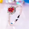 the Classic PT950 Platinum Twisted Arm Ring for Women Dazzling Group with Mosan Diamond Pigeon Red Stone Ring