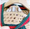 Maglioni di lusso da nuova donna Designer Autunno Lettera Ricamo Scava fuori lavorato a maglia Manica lunga Maglione corto di lana per ragazze Donne
