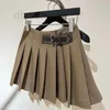 Rokken ontwerper 2023 herfst nieuwe Britse academie stijl noodlijdende riem buckle geplooide rok dameshelft conk