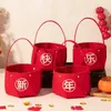 Cadeau cadeau 4pcs boîtes de bonbons de l'année chinoise de la boîte d'emballage de collation de dragon avec poignée pour les fournitures de fête du festival de printemps 2024