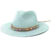 Szerokie brzegowe czapki HT3653 Spring Summer Sun Hat Women BEADS Zespół Fedoras Panama Ladies Strraw Vacation Cap Famel Filppy