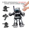 Robot RC Robot RC Giocattoli per bambini con effetti sonori di luce fredda Rilevamento di gesti Telecomando Robot da battaglia Ragazzi e ragazze Regalo per bambini 231204