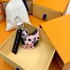 Porte-clés longes pour sac à biscuits, porte-clés suspendu pour voiture, fleur, bijoux à breloques, cadeaux pour femmes et hommes, clé en cuir PU à la mode