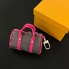 حقائب مصممة Womens Key Heyrets العلامة التجارية الفاخرة Mini Boston Bag Bags Bags Coin Poundes Mini Keepall Bags Keychain Letter Men Totes Crossbody Prendant Charms