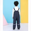 Jumpsuits Fleece Regenbroek Overall Kids Jongen Waterdichte Baby Meisjes Jumpsuit Outdoor Sport Kinderen Broek Peuter Sneeuwbroek Kleding 231204