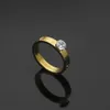 Anillo de amor extravagante de calidad superior Cuatro puntas Solitario Diamante Oro Plata Rosa Colores Acero inoxidable Pareja Anillos Moda Mujer 314U