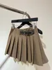 Designer di gonne 2023 Autunno New British Academy Academy Angogated Belt Bishle Skirt Skirt Women's Half Conk
