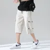 Shorts pour hommes outillage en soie glacée longueur au genou pour hommes été en plein air Sports amples grande taille poche élastique imprimé pantalon à séchage rapide