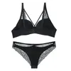 Sexig uppsättning 2018 Ny Sexig ihålig produkt Axless Bra Thong Set BCDE Cup Brodery Lace Push Up Women's Underwear Bacd Stängt underkläder 231205