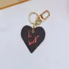 Designer Leather Car bag Keychain Key rings Fashion Heart Love Pendant Stainless Steel Key Chain Pandents Charm Brown Flower Keych232i