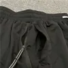 DNA Short de sport américain tendance décontracté ample marque de mode pantalon de basket-ball course Fitness pantalon short pour hommes