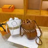 Zincir Güzellik Kafası Kova Çantası Moda Torbası Kore Edition Koyu Renkli El Kadın Çanta Zinciri Bir Omuz Crossbody Bag Tide 231115