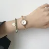 Orologi da polso 2023 Orologio da donna Piccolo braccialetto rigido in oro rosa alla moda per ragazze Orologi impermeabili Orologio regalo per le vacanze