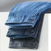 Pantaloncini da uomo 2023 Jeans corti elasticizzati estivi Tessuto Lyocell di marca maschile Business Denim Dritto di alta qualità Nero Blu