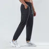 Pantaloni sportivi Lulu per pantaloni da uomo ad asciugatura rapida autunnali all'aperto, bordatura elastica in tessuto sciolto, pantaloni da lavoro per fitness e tempo libero