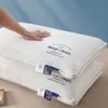 枕ニット綿は崩壊していない柔らかい快適な換気療法脊椎を保護し、学生のための睡眠を援助する大人231205