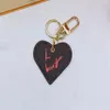 Designer Leather Car bag Keychain Key rings Fashion Heart Love Pendant Stainless Steel Key Chain Pandents Charm Brown Flower Keych232i