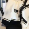 Женские свитера осень-зима кашемировый свитер Женская корейская мода с V-образным вырезом в стиле пэчворк Черный или белый кардиган Свободная верхняя одежда Топы 231204