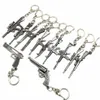 Hela 50st Lot Game Gun Model Key Chain Metal Alloy Nyckelringar Keys Hållare STORLEK 6CM BLister Card Package Key Chains271R