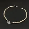 Créateur de mode de luxe planète pendentif conception collier de perles dames collier de diamant exquis simple super haute qualité cadeau d'anniversaire de noël