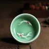 Pucharki herbaty 60 ml Chińskie Longquan Celadon Porcelna China Tea Cup i spodka do herbaty ze złotą rybą Cake Cracle Crackle Crackle 231204