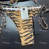 Sexig rygglös bikini -sträng halter bikini tiger tryckt bikini stilfull tryckt strand baddräkt snabb torkning baddräkt för sommar surfing