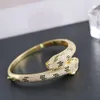 Bracelets de créateurs pour hommes et femmes Luxe haut de gammeChen double tête de léopard plein diamant micro incrusté de zircon industrie lourde version fixe haute étoile même style